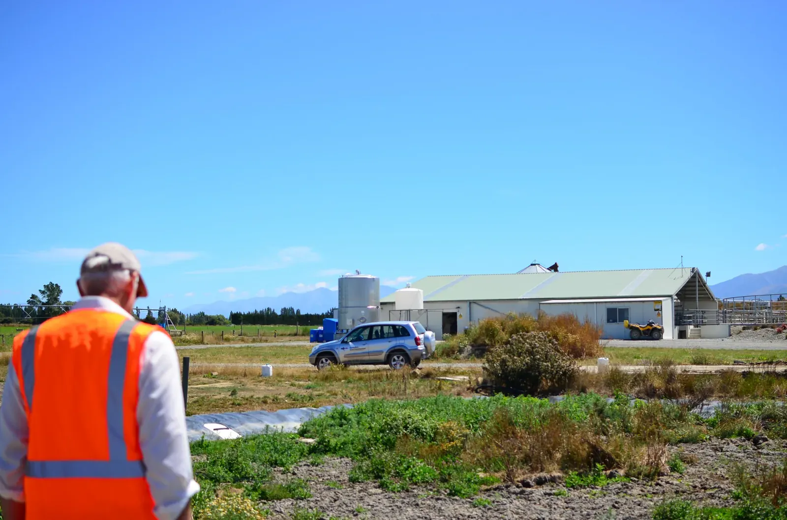 A consultant carrying out a site assessment on a Canterbury property.